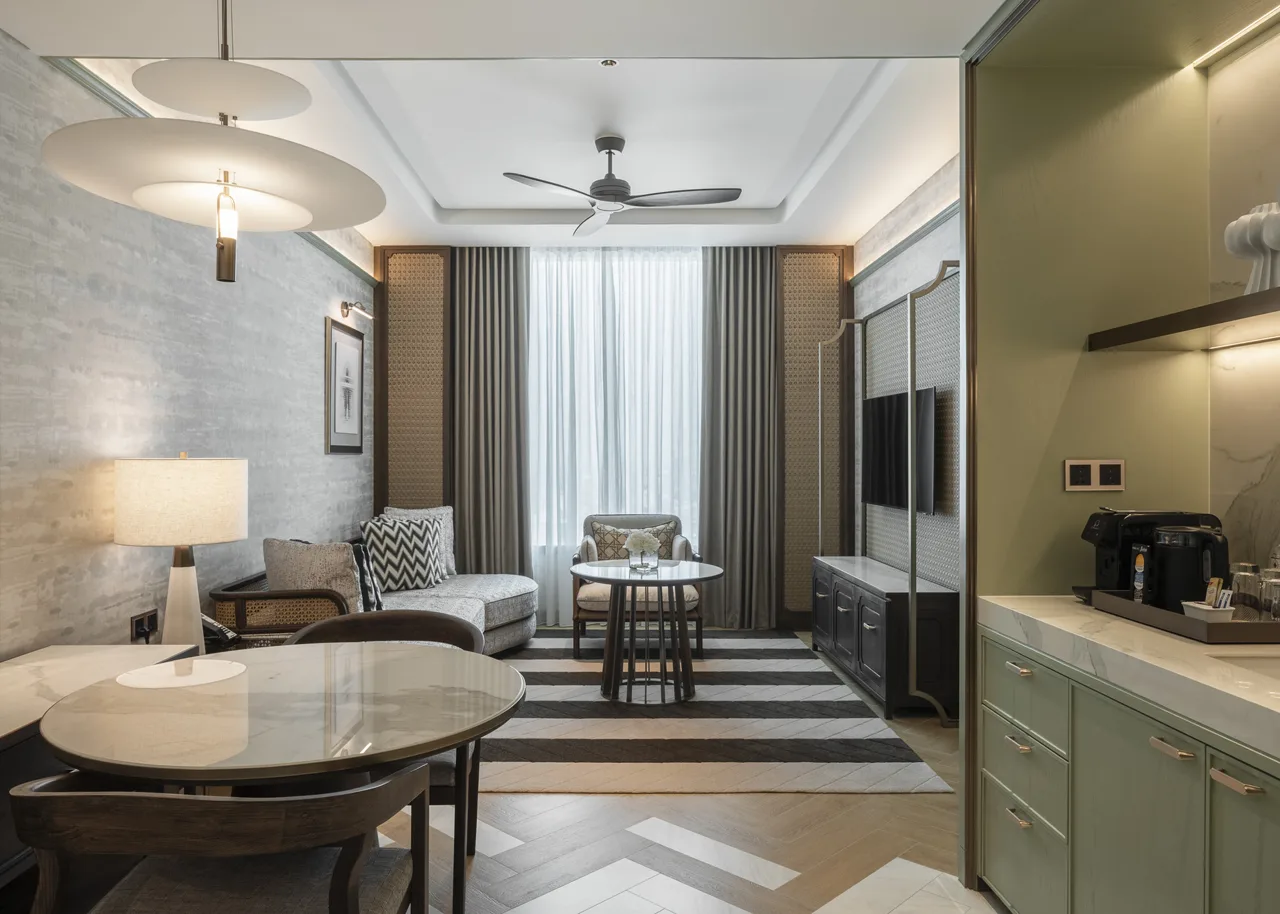 Governor Suite • Living / Dining Governor Suite living + dining – city-skyline view through curtain wall