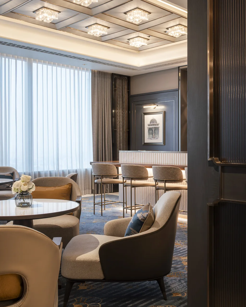 Suite lounge – full-height book-matched marble door