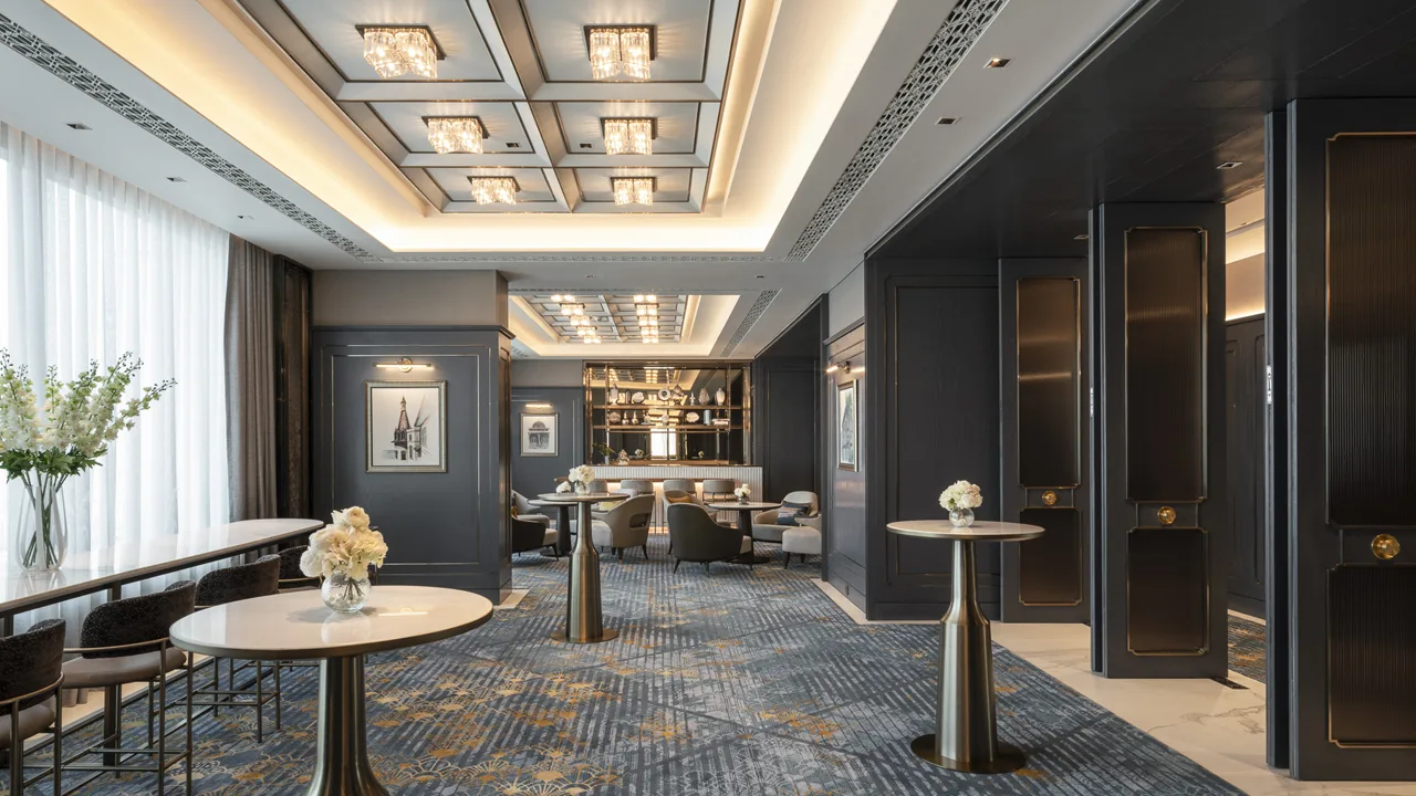 Suite • Lounge Suite lounge – doorway framing chandeliers