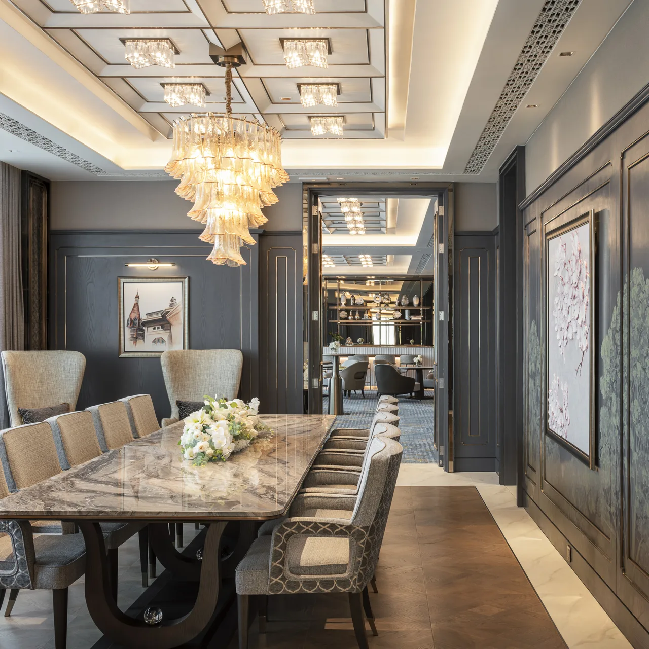 Suite lounge – doorway framing chandeliers